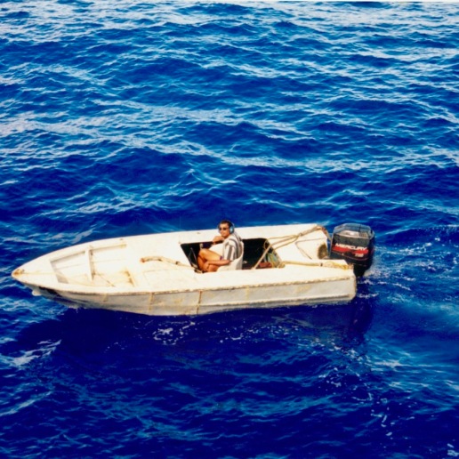 Tino (assistant skiffman) operating one of the speedboats